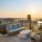 rooftop deck with water and city views