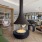 round fire place surrounded by chairs