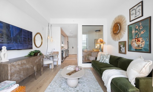 open living concept showing living room and kitchen combined with ample space for seating and modern living room decor
