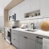 Kitchen with decorative tile backsplash 