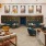 spacious lounge with high ceilings and ample lighting throughout
