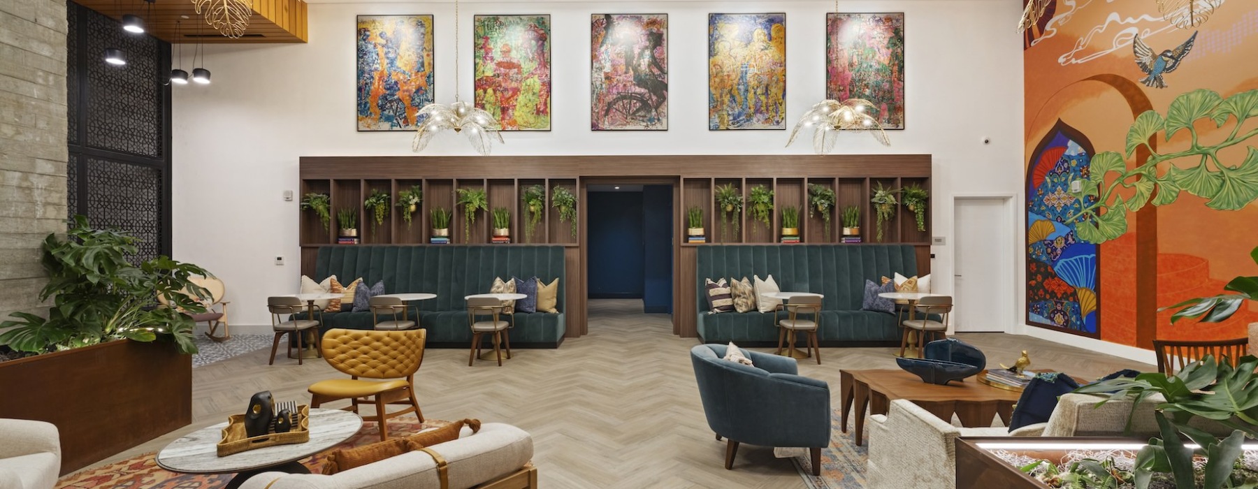 Lobby with vibrant mural and lounge seating