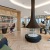 hanging chairs and fire place in rooftop lounge