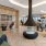 hanging chairs and fire place in rooftop lounge