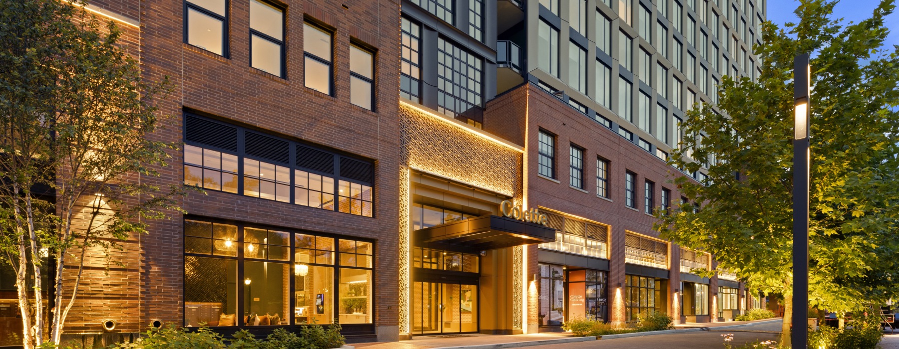 Colette exterior entrance with soft lighting at dusk