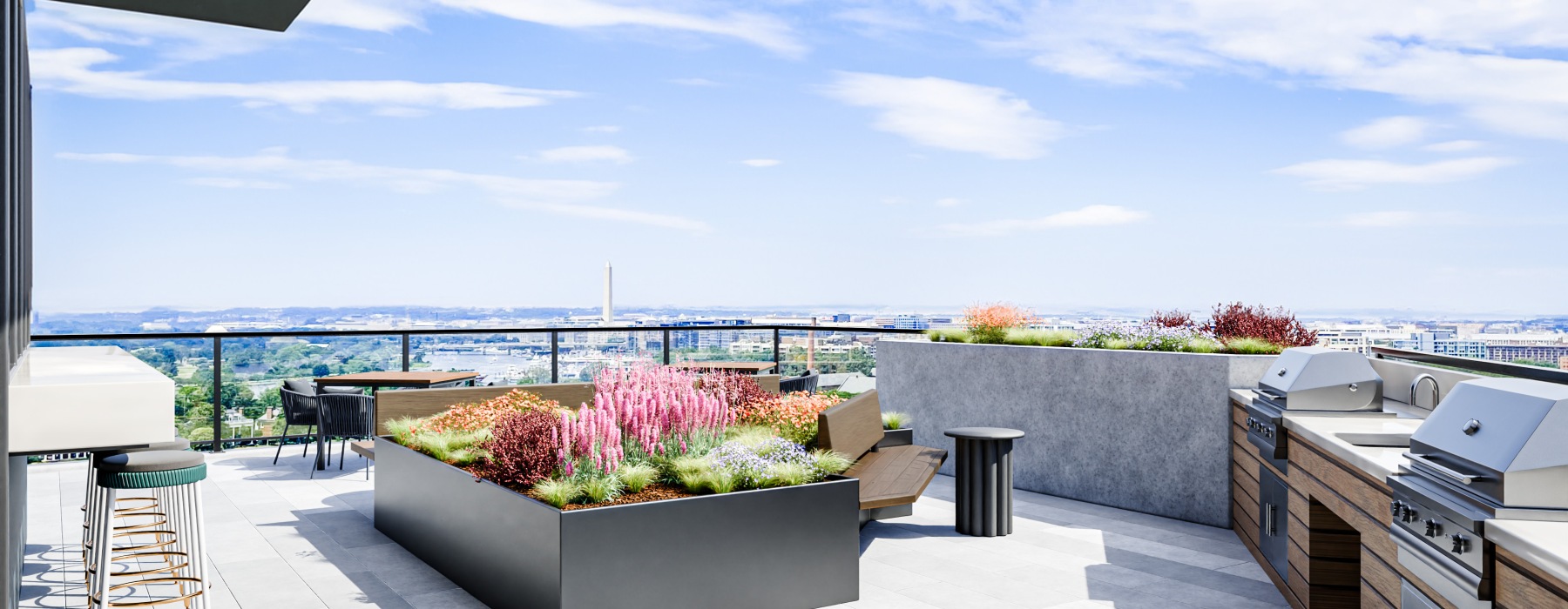 Penthouse terrace with tables, chairs, and greenery